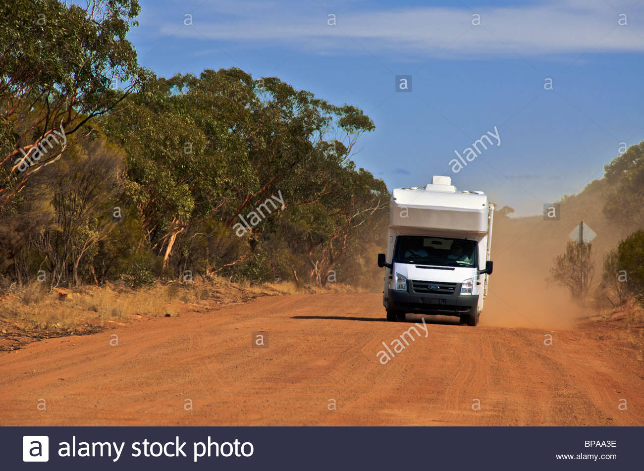 motorhome-on-unsealed-dusty-outback-road-western-australia-BPAA3E.jpg
