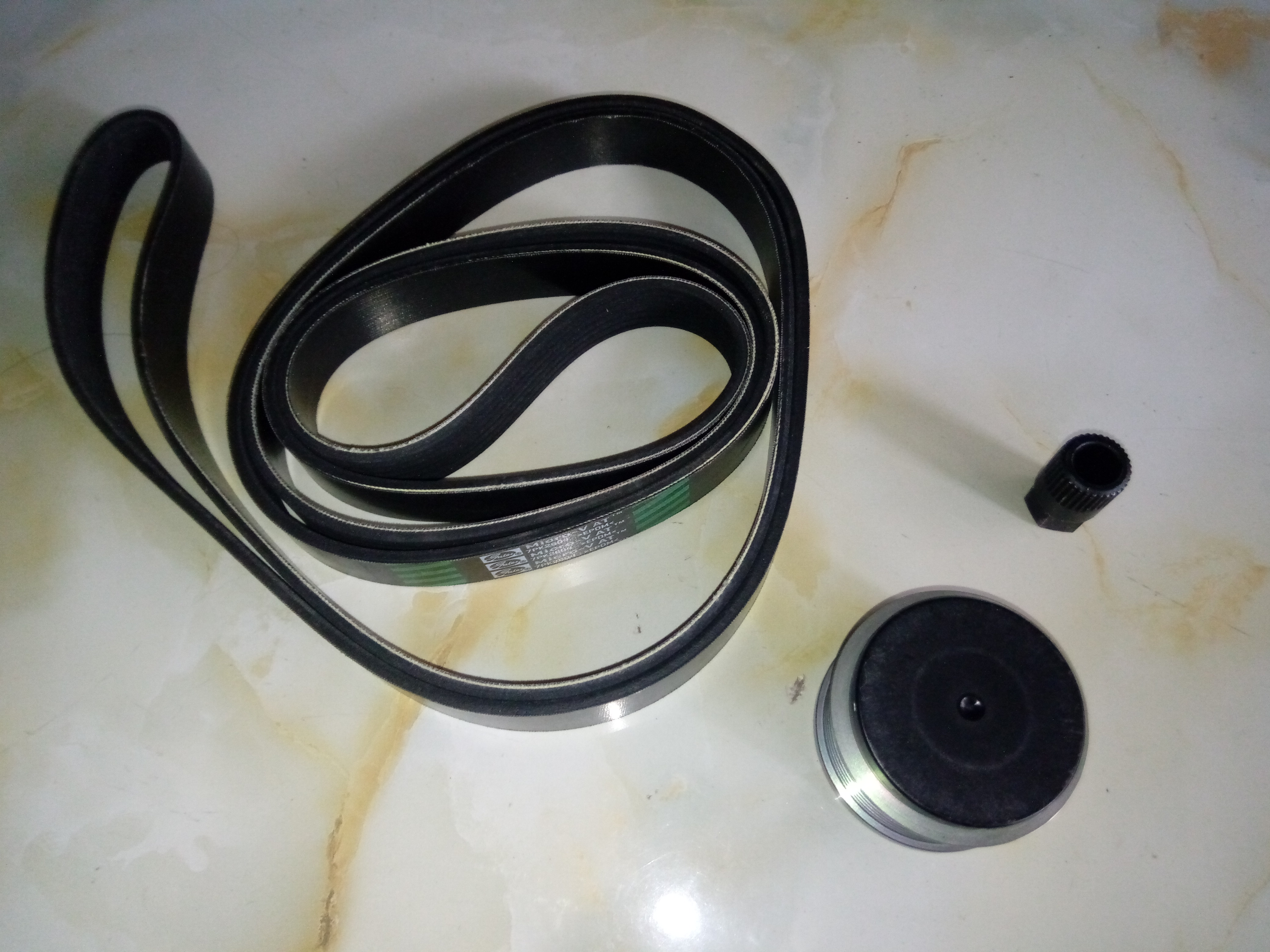 很久以前买的皮带单向轮及拆单向轮的工具。